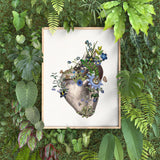 Blue and lavender flowers over a human Heart Poster